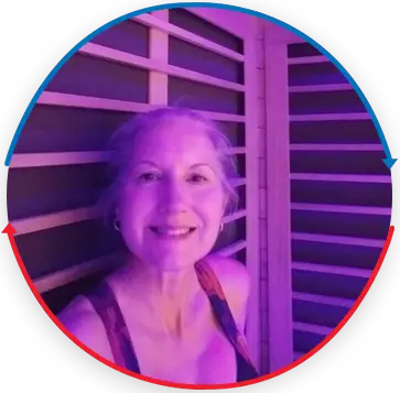 woman using infrared sauna for muscle soreness and relaxation